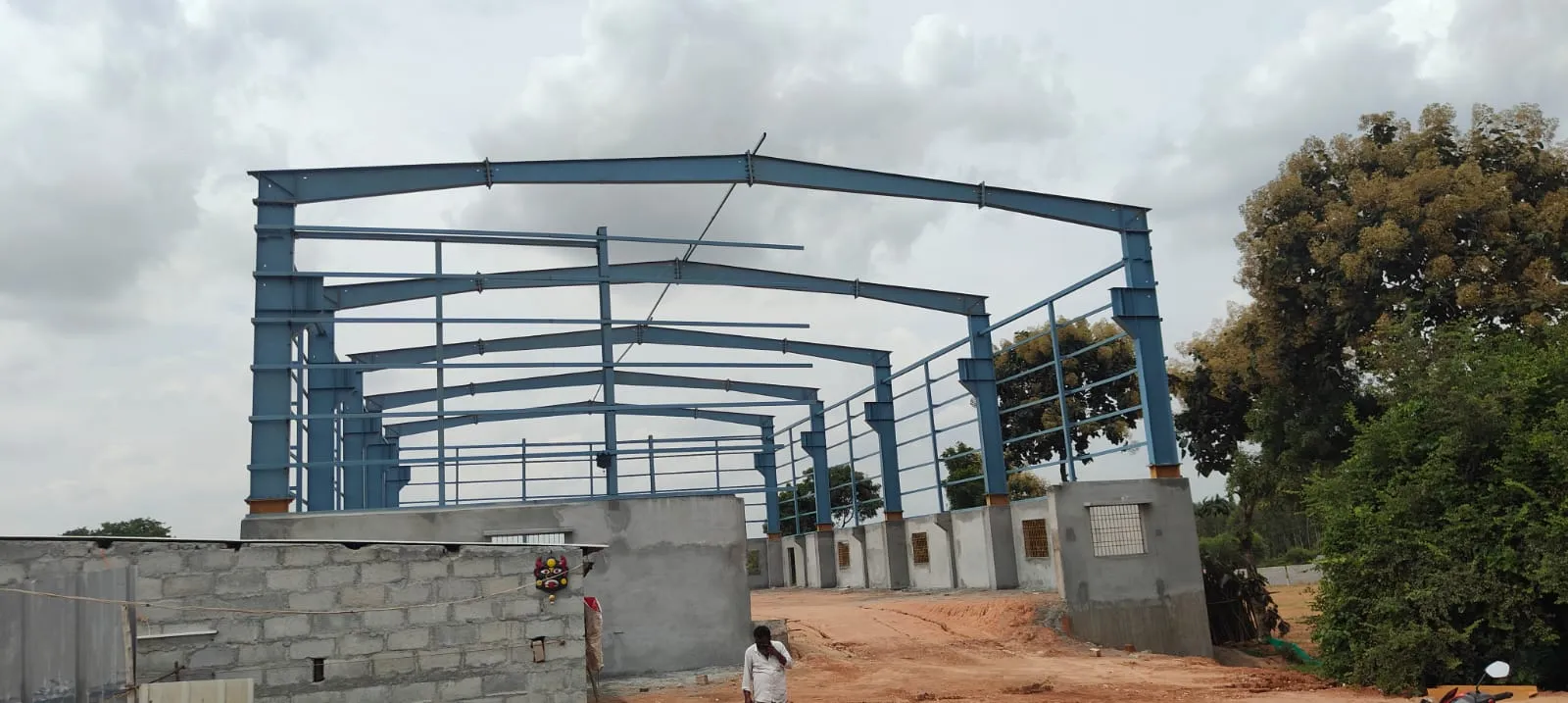 Industrial plant demolition Bangalore — recovered structural steel and machinery sorted for scrap buyback