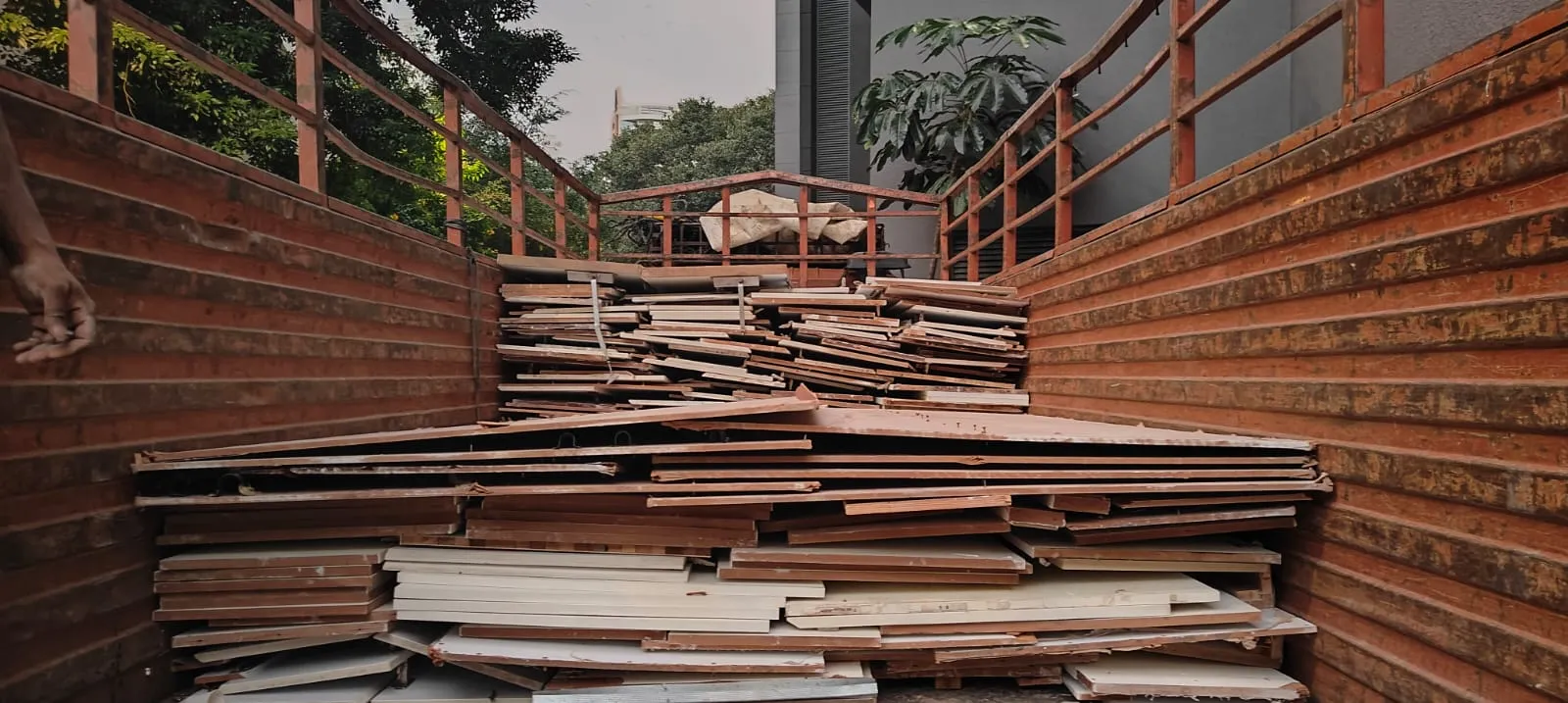 Interior demolition services in Bangalore — Urban Eco Recyclers crew carrying out non load bearing wall removal and floor hacking inside an office