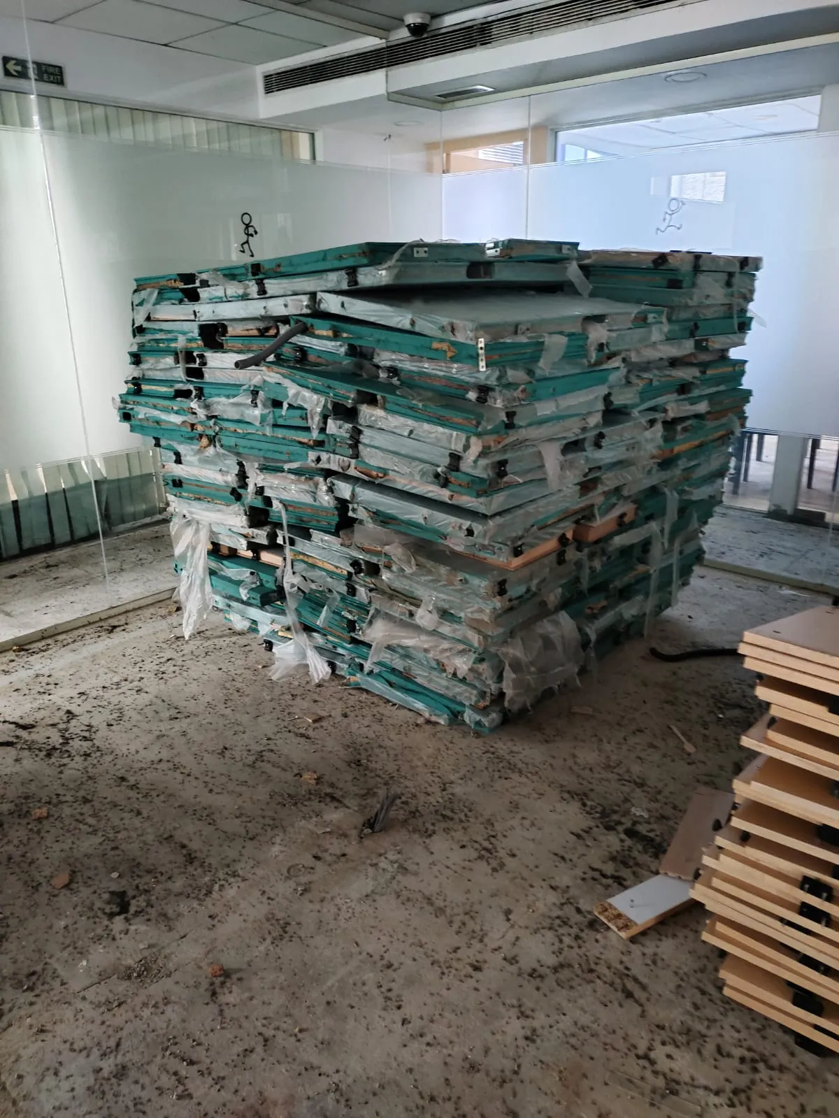 Interior demolition scrap buyback Bangalore — recovered metal framing, doors and fittings sorted for salvage after office strip out