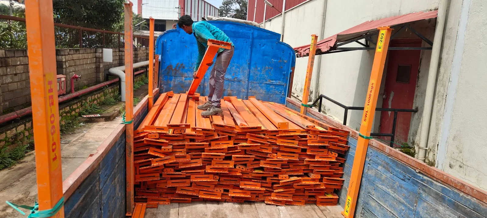 Construction waste management services Bangalore — tipper trucks hauling concrete and rubble to a BBMP-compliant yard