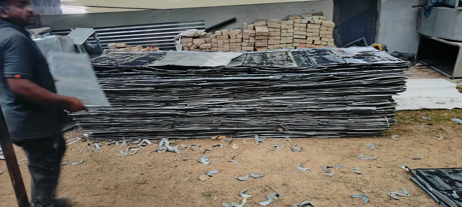 Construction debris removal in Bangalore — Urban Eco Recyclers loading demolition rubble into a tipper truck