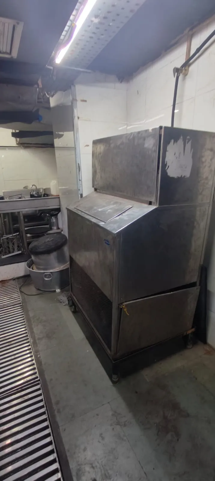 Commercial hotel kitchen dismantling with stainless steel equipment and ice machine asset recovery by Urban Eco Recyclers