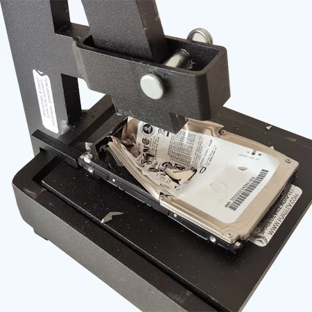 Hard drive shredding services in Bangalore reducing HDDs to metal fragments