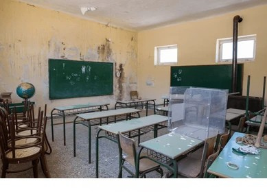 School and college dismantling services in Bangalore — Urban Eco Recyclers crew stripping out a classroom and campus interior