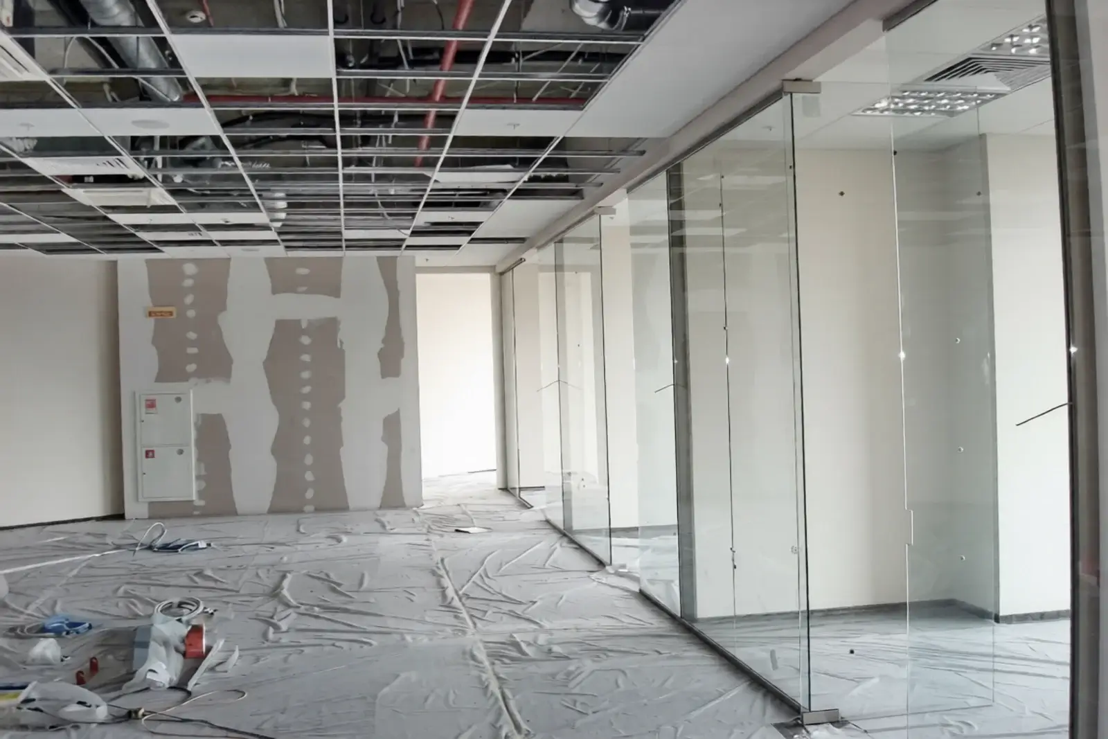 Showroom dismantling services in Bangalore — Urban Eco Recyclers crew stripping out a retail showroom interior