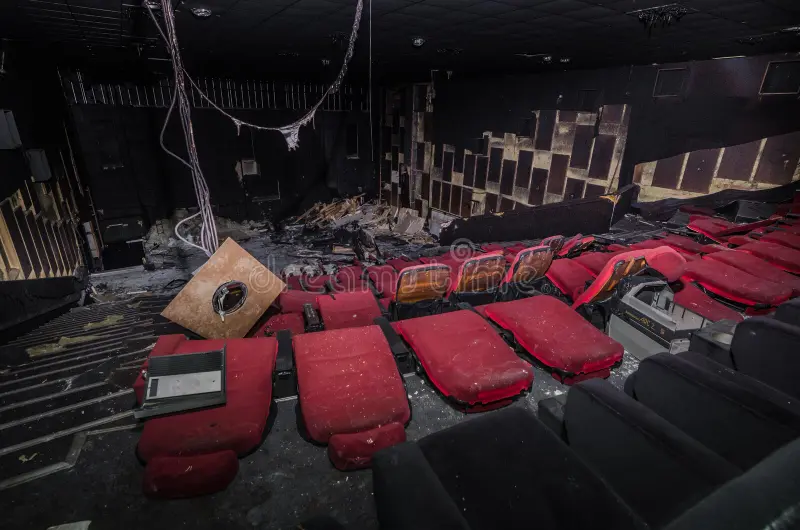 Cinema and theatre dismantling services in Bangalore — Urban Eco Recyclers crew stripping out a multiplex auditorium interior